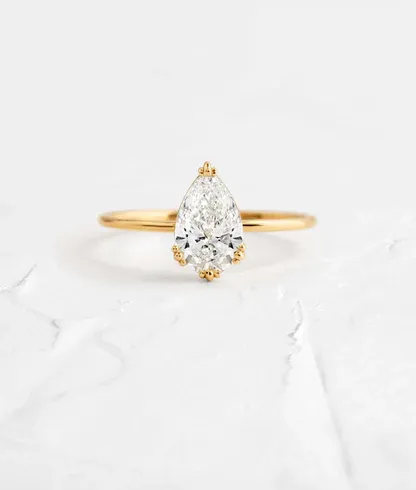 Pear shaped hot sale diamond ring